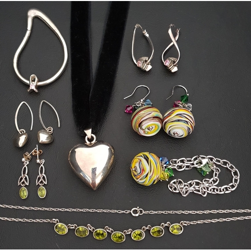 21 - FOUR SUITES OF SILVER MOUNTED JEWELLERY
comprising a pair of Murano glass bead earrings and matching... 