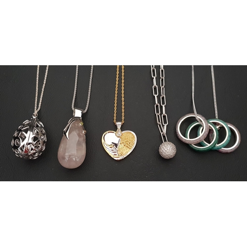 110 - FIVE SILVER AND SILVER MOUNTED PENDANTS ON CHAINS
comprising a rose quartz example with gem set silv... 