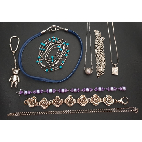 237 - SELECTION OF SILVER AND SILVER MOUNTED JEWELLERY
including a rose link bracelet, a leather necklace ... 