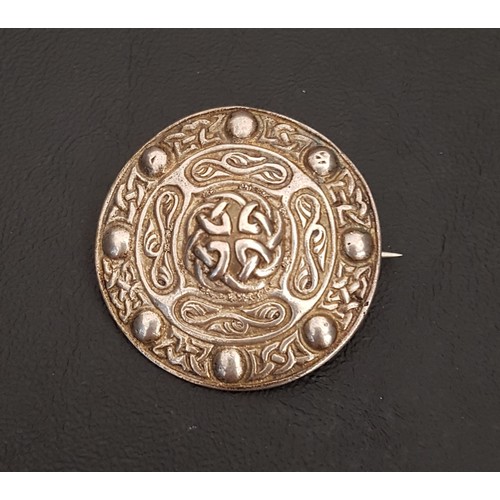 95 - ALEXANDER RITCHIE IONA SILVER BROOCH
the circular shield design brooch with entwined Celtic knot dec... 