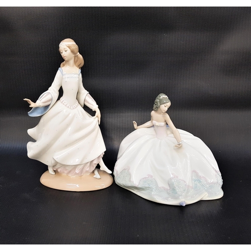 312 - TWO LLADRO FIGURINES
comprising Cinderella numbered 4828 modelled as a lady in a full length gown mi... 