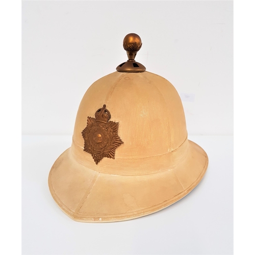 469 - ROYAL MARINES PITH HELMET
with brass cap badge and brass ball to the crown, with a leather and inter... 