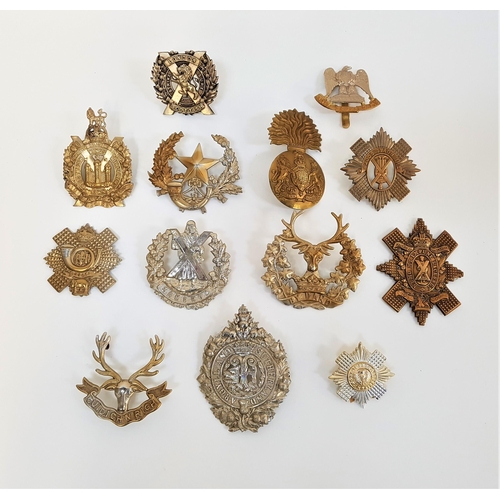 470 - SELECTION OF MILITARY CAP BADGES
including the Queens Own Cameron Highlanders, Kings Own Scottish Bo... 