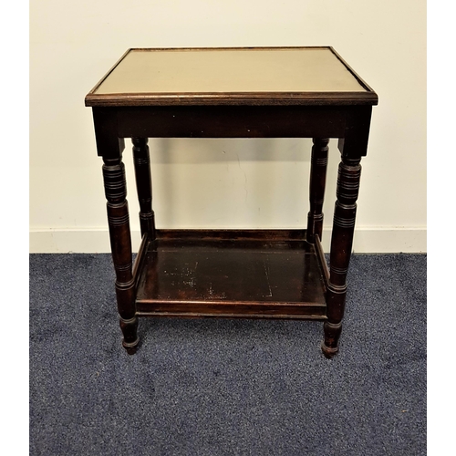 528 - EDWARDIAN ELM TEA TROLLEY
with a rectangular inset glass top with a galleried shelf below, on caster... 