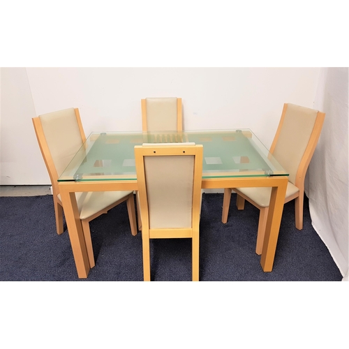 531 - GLASS FLOATING TOP DINING TABLE AND CHAIRS
the table on a pale ash frame, 76.5cm x 130cm, together w... 