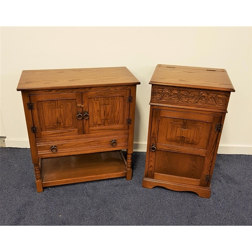 533 - JAYCEE OAK SIDE CABINET
with a moulded top above a pair of carved linen fold doors with a drawer bel... 