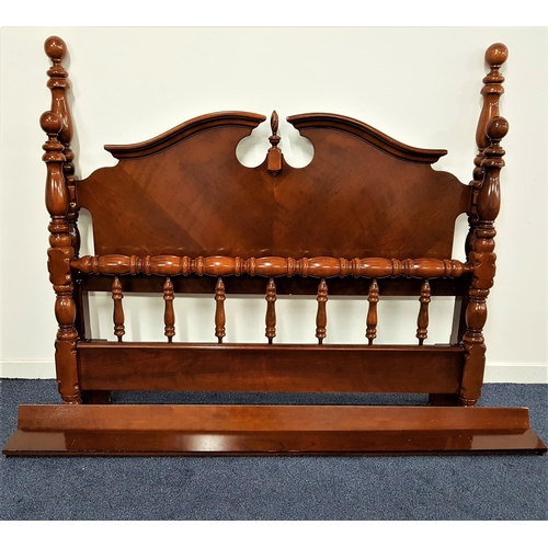 535 - ORNATE CARVED CHERRY DOUBLE BED
with a shaped head and footboard, 162cm wide