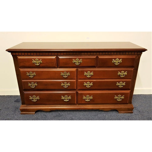 537 - LARGE CHERRY CHEST OF DRAWERS
with a moulded top above a dentil frieze with an arrangement of seven ... 