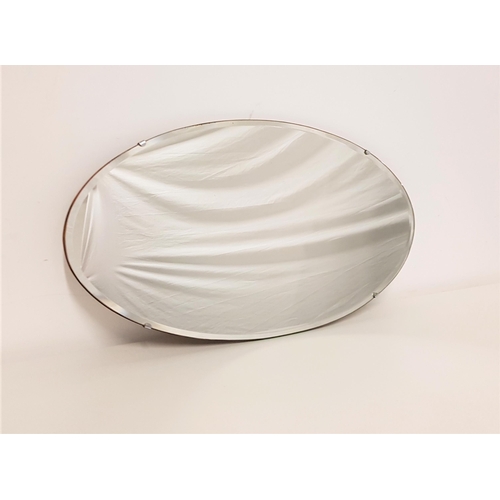 543 - OVAL WALL MIRROR
with a bevelled plate, 66cm high