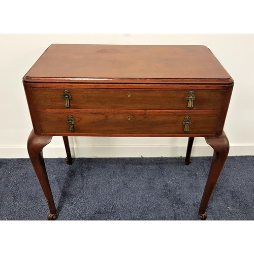 550 - MAHOGANY TABLE CANTEEN
with a moulded top above two drawers now lacking flatware, bearing a retailer... 