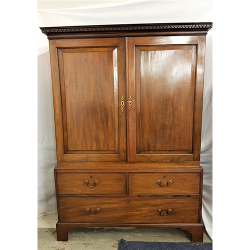 589 - GEORGE III AND LATER MAHOGANY PRESS CUPBOARD
with a moulded cornice above a pair of panelled doors o... 