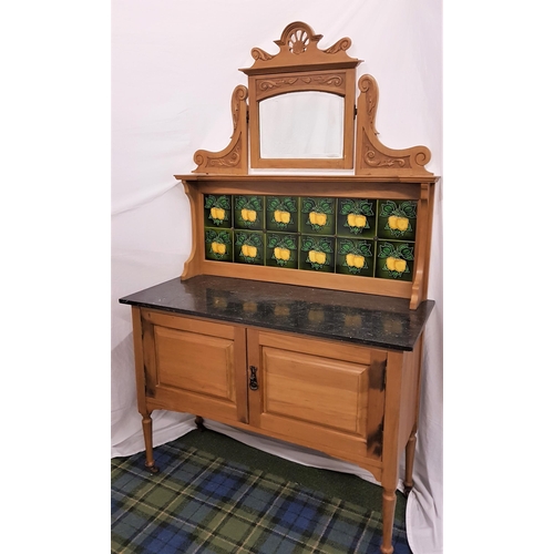 612 - EDWARDIAN WALNUT WASH STAND
with a tiled raised back with a bevelled shaped mirror with carved suppo... 