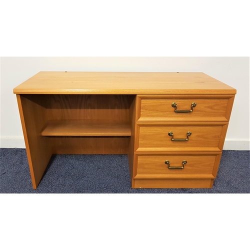 615 - G PLAN TEAK KNEEHOLE DRESSING TABLE
with a rectangular top with three off set panelled drawers and a... 