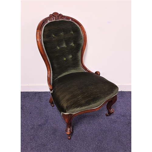 620 - VICTORIAN MAHOGANY BUTTON BACK NURSING CHAIR
with a shaped seat, covered in bottle green velvet and ... 