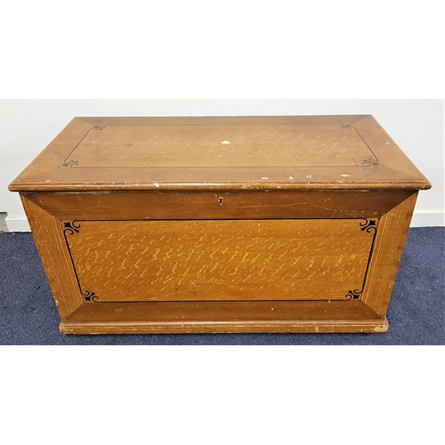 621 - LARGE PITCH PINE COFFER
with a lift up lid and side carrying handles, standing on squat bun feet, 70... 