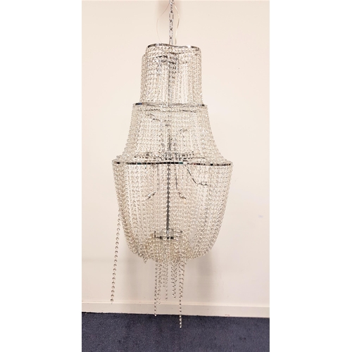 630 - LARGE MODERN CHANDELIER
with a shaped chrome frame hung with faceted glass beads with an internal ch... 