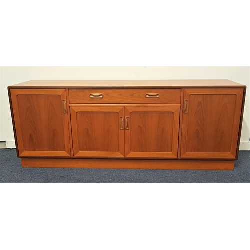 633 - G PLAN TEAK SIDEBOARD
with a central drawer above a pair of cupboard doors flanked by a further pair... 