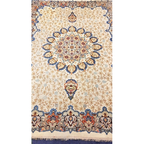 643 - LARGE WOOL RUG 
with a cream ground decorated with stylised motifs, 377cm x  278cm