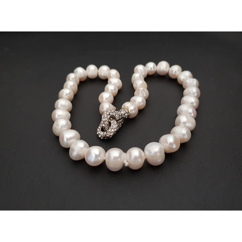 231 - FRESHWATER PEARL NECKLACE
with CZ clasp, 45cm long