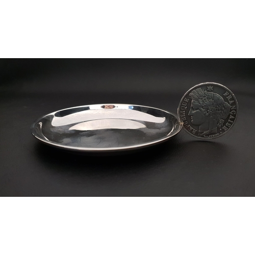 252 - CARTIER SILVER EMPTY POCKET TRAY
with an 1851 5 Franc coin handle, the base marked Cartier Paris 182... 