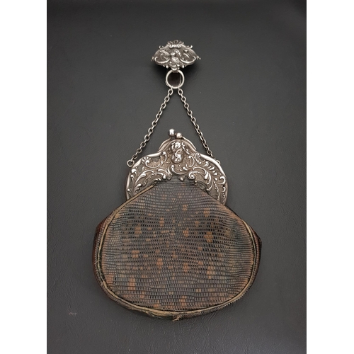 257 - UNUSUAL VICTORIAN SILVER MOUNTED LADIES PURSE
the lizard skin purse with embossed silver cantle deco... 