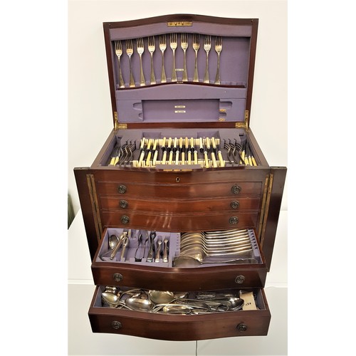 378 - MAHOGANY CANTEEN OF CUTLERY
with a serpentine lift up lid above five graduated drawers with a part O... 