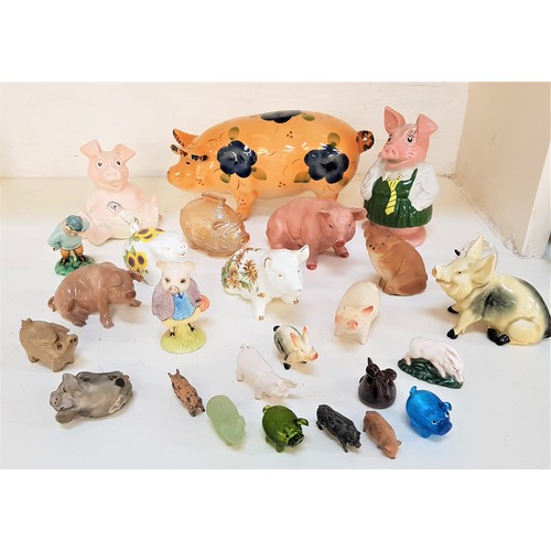 305 - LARGE SELECTION OF POTTERY AND OTHER PIG ORNAMENTS
including two Wade piggy banks from the Natwest B... 