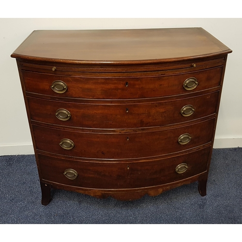 588 - GEORGE III MAHOGANY BOW FRONT CHEST OF DRAWERS
with a moulded top above a brushing slide and four gr... 