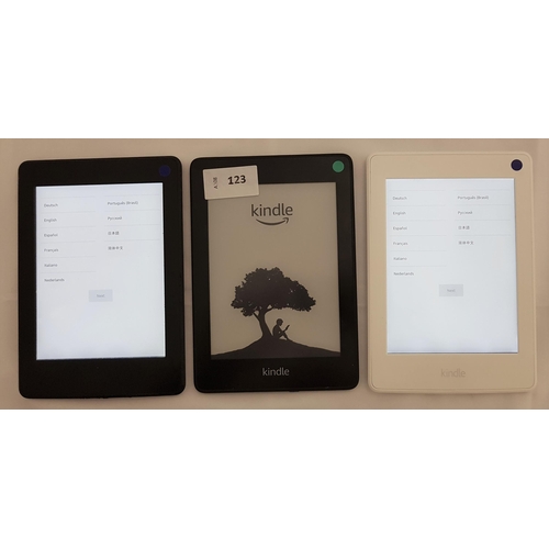 123 - THREE AMAZON KINDLE E-READERS
comprising Paperwhite 4 10th generation, serial number G000 PP07 8367 ... 