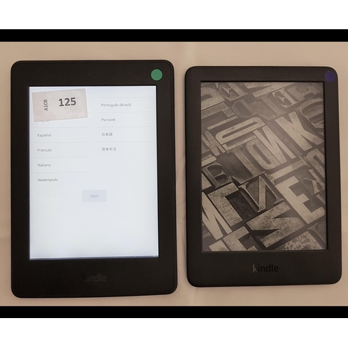 125 - TWO AMAZON KINDLE E-READERS
comprising Paperwhite 3 7th generation, serial number G090 G105 6346 0LX... 