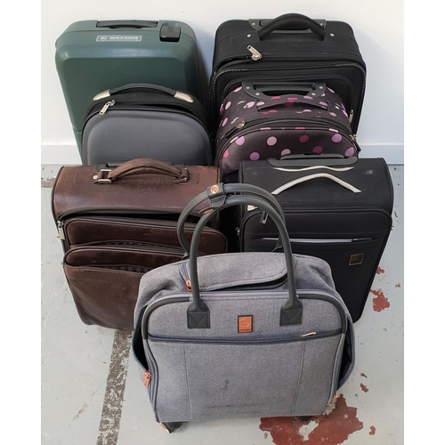 5 - SELECTION OF SEVEN SUITCASES 
including Samsonite, Saxoline, Tracker, GF, Ariana
Note: suitcases are... 