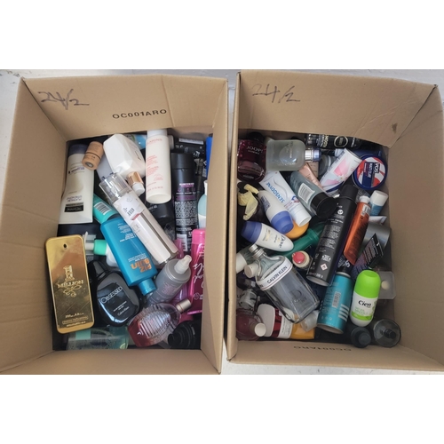 24 - TWO BOXES OF NEW AND USED TOILETRY ITEMS
including Lacoste, Calvin Klein, Paco Rabanne, Joop!, Clari... 