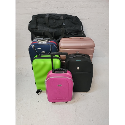 6 - SELECTION OF NINE SUITCASES AND ONE HOLDALL 
including Gogo, IT Luggage, RGL, Flight Knight, Gravitt... 