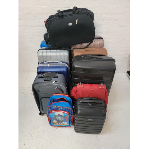 7 - SELECTION OF EIGHT SUITCASES, THREE HOLDALLS AND ONE RUCKSACK 
including Kangol, Mattiolo, Tripp, Tr... 