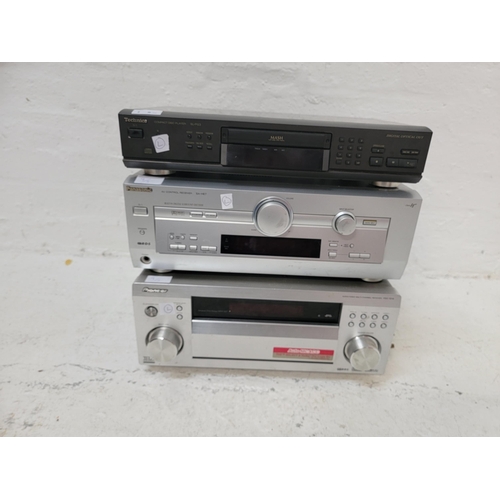 9 - TWO MULTI-CHANNEL RECIEVERS AND ONE COMPACT DISC PLAYER
including Technics, Panasonic and Pioneer