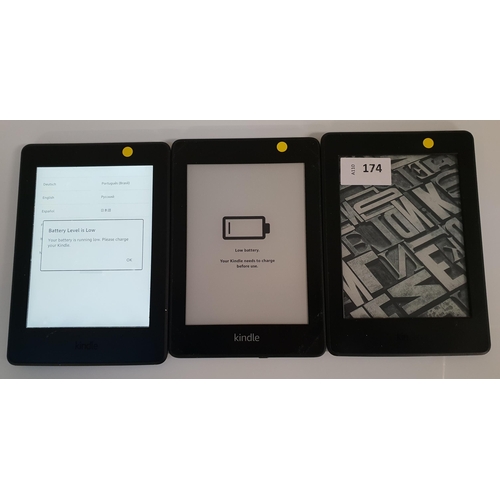 174 - THREE AMAZON KINDLE E-READERS
comprising Paperwhite 3 WIFI & 3G 7th generation, serial number G090 G... 