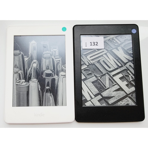 132 - TWO AMAZON KINDLE E-READERS
comprising a Paperwhite 3 white, serial number G090 KB03 6476 05HX; and ... 