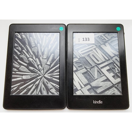 133 - TWO AMAZON KINDLE PAPERWHITE E-READERS
comprising a Paperwhite 3, serial number G090 G105 6347 015G;... 