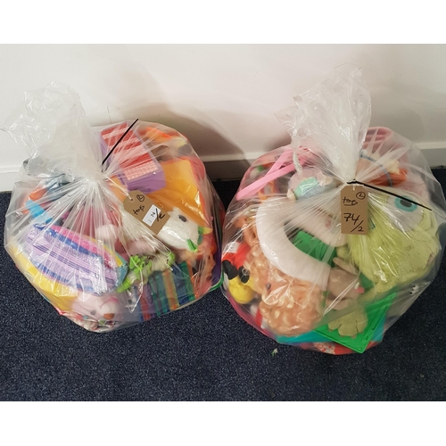 74 - TWO BAGS OF TOYS AND GAMES
including soft toys and games