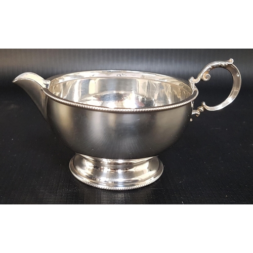 215 - GEORGE V SILVER MILK JUG
of squat form, Birmingham 1924, 100g/3.5oz