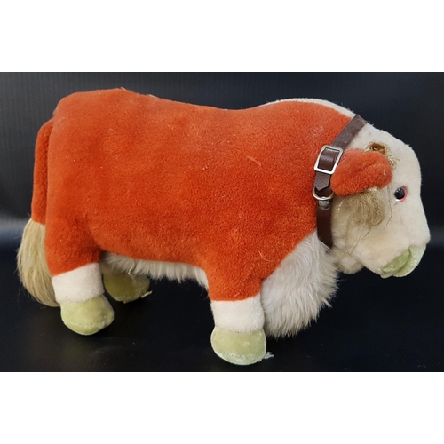358 - VINTAGE MERRYTHOUGHT PLUSH BULL
in brown and white, with a collar, 19cm high