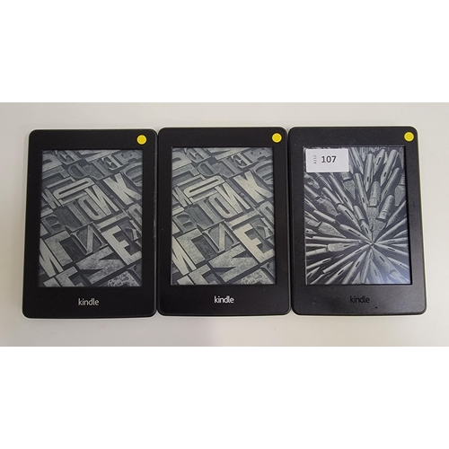 107 - THREE AMAZON KINDLE E-READERS
comprising Paperwhite 3, serial number G090 G105 5435 052G; Paperwhite... 