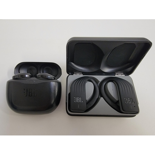 75 - TWO PAIRS OF JLB EARBUDS
in charging cases