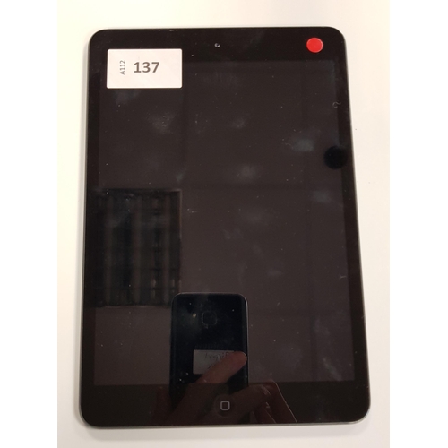 137 - APPLE IPAD MINI - A1432 - WIFI 
serial number F4MK23L1F193. Apple account locked. 
Note: It is the b... 