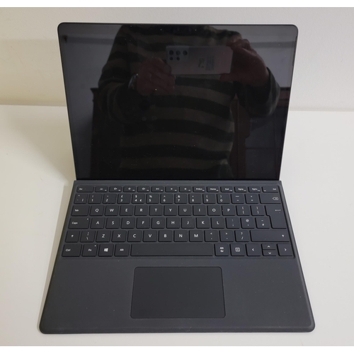 222 - MICROSOFT SURFACE PRO X
model 1876; 128GB; serial number 024400200853. Wiped but appears to be an is... 