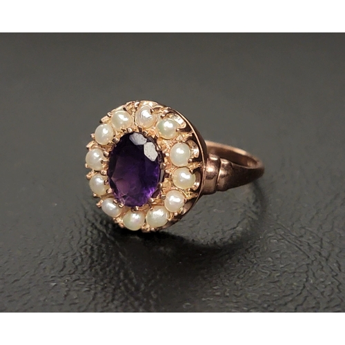 120 - AMYTHYST AND PEARL CLUSTER RING
the central oval cut amethyst approximately 1ct in a twelve pearl su... 