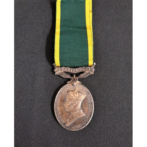 389 - GEORGE VI EFFICIENCY MEDAL
with Territorial clasp, named to 2976425 GNR. L. Hamilton. R.A. with ribb... 