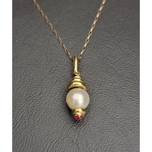7 - PEARL AND RUBY SET PENDANT
in eighteen carat gold and on nine carat gold chain, the pendant 3cm long... 
