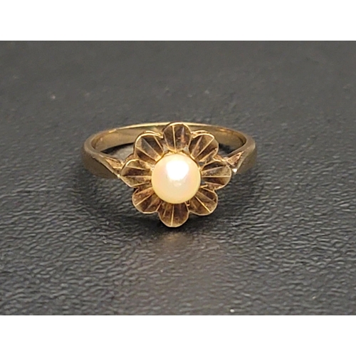 69 - PEARL SET SINGLE STONE RING
on nine carat gold shank with petal effect setting, ring size P and appr... 