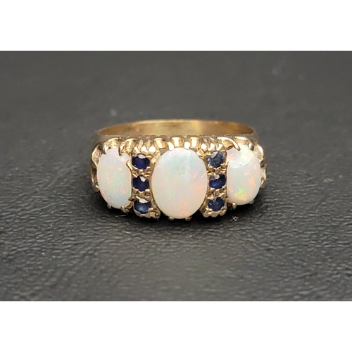 70 - GRADUATED OPAL AMD SAPPHIRE DRESS RING
the three oval cabochon opals separated by small sapphires se... 